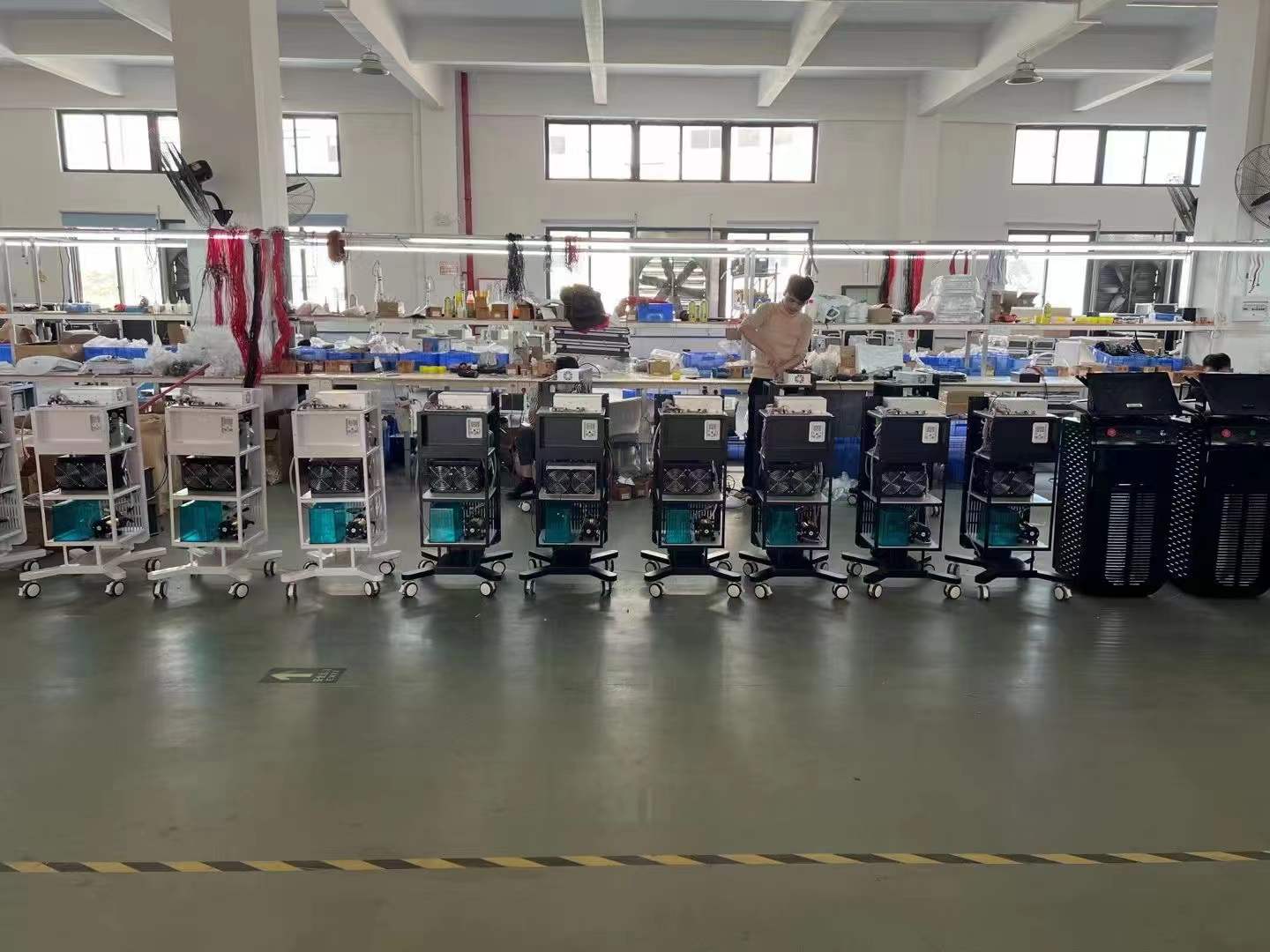 BY BEAUTY beauty machines arranged on the Guangzhou production floor