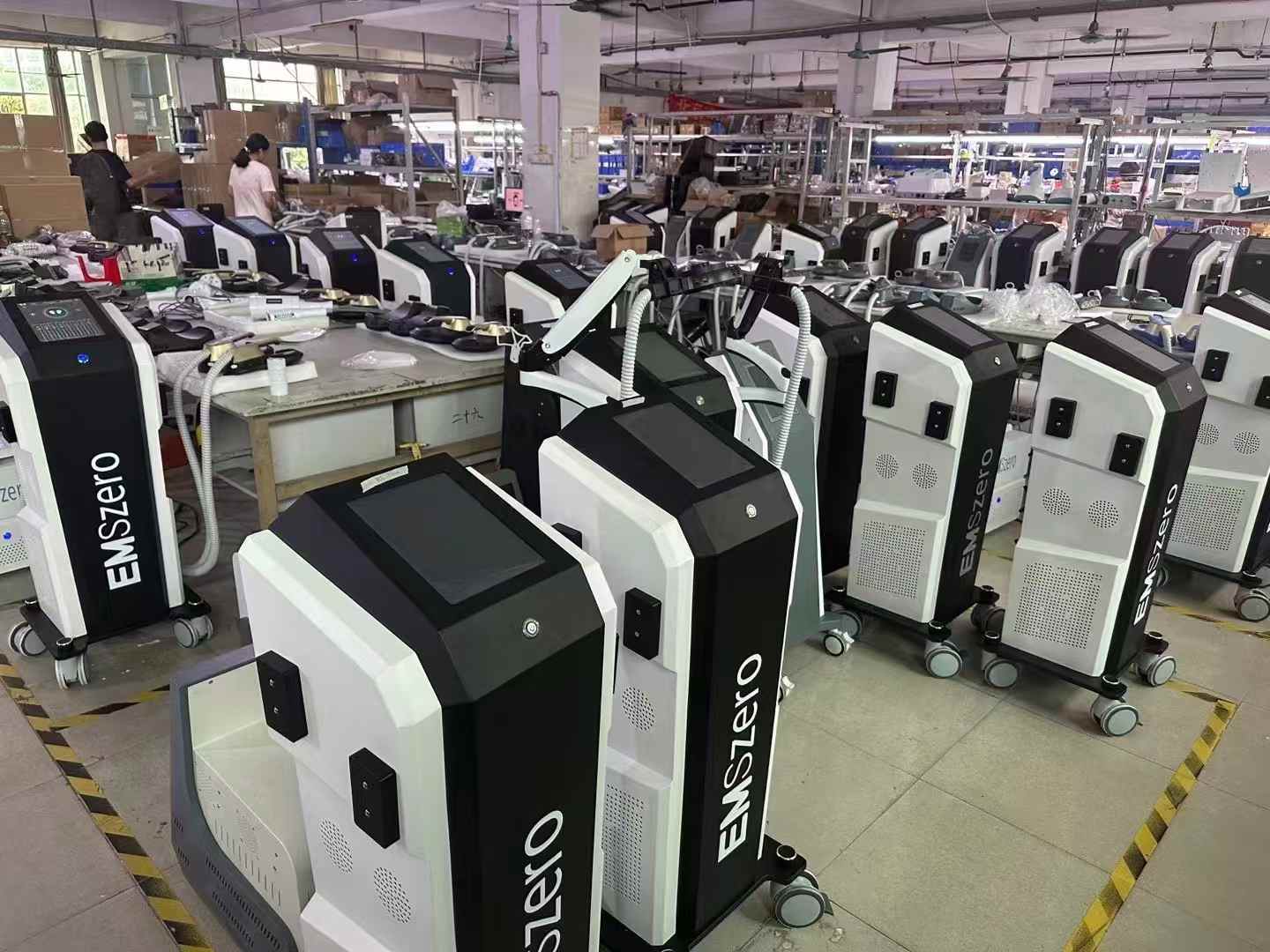 Different beauty machine platforms arranged on the BY BEAUTY factory floor